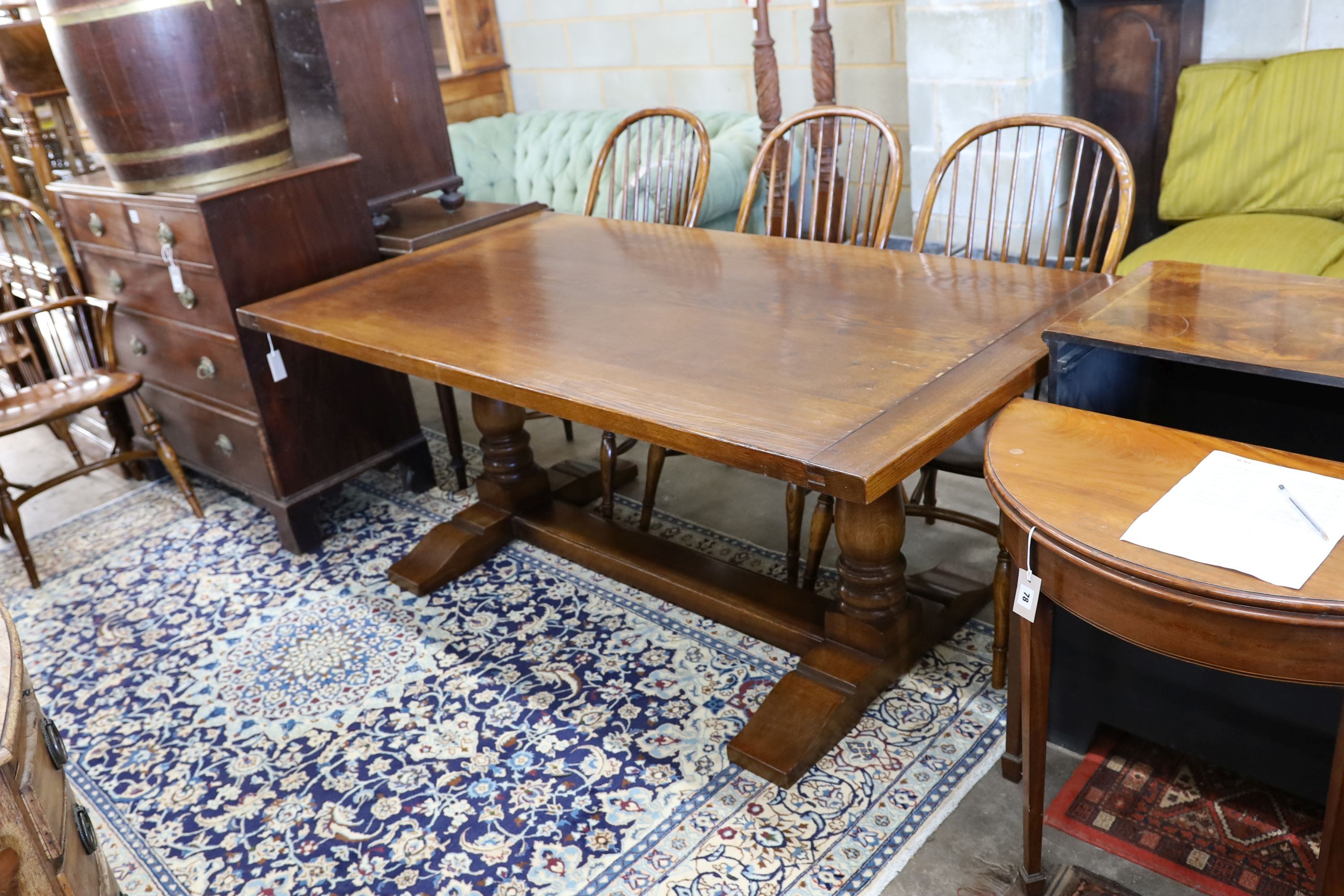 A 17th century style rectangular oak refectory dining table, length 183cm, depth 100cm, height 76cm